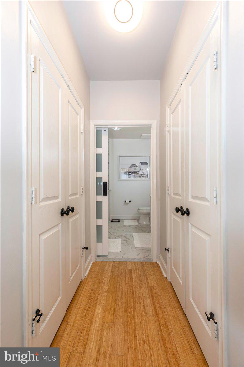 2500 Waterside Drive, Unit 110 Frederick, MD 21701 - Photo 36 of 106 a view of a bathroom with a tub and shower
