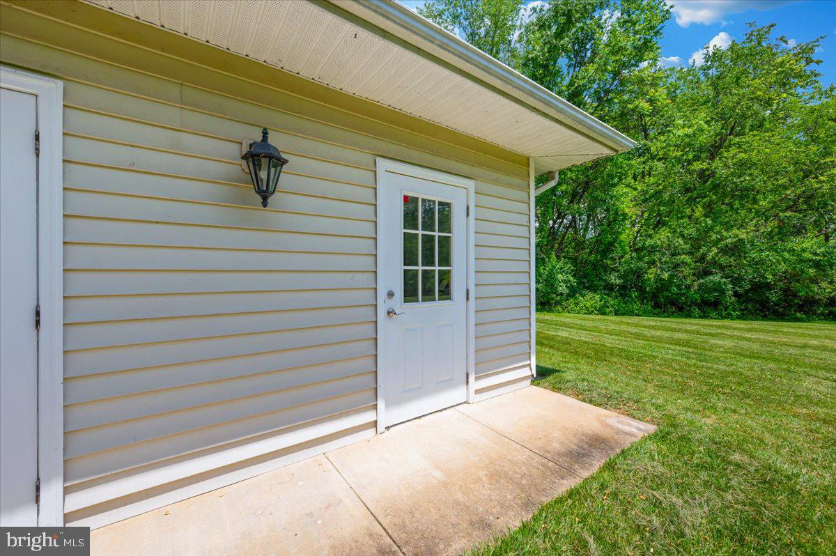 2500 Waterside Drive, Unit 110 Frederick, MD 21701 - Photo 51 of 106 a view of backyard with a garden and entertaining space
