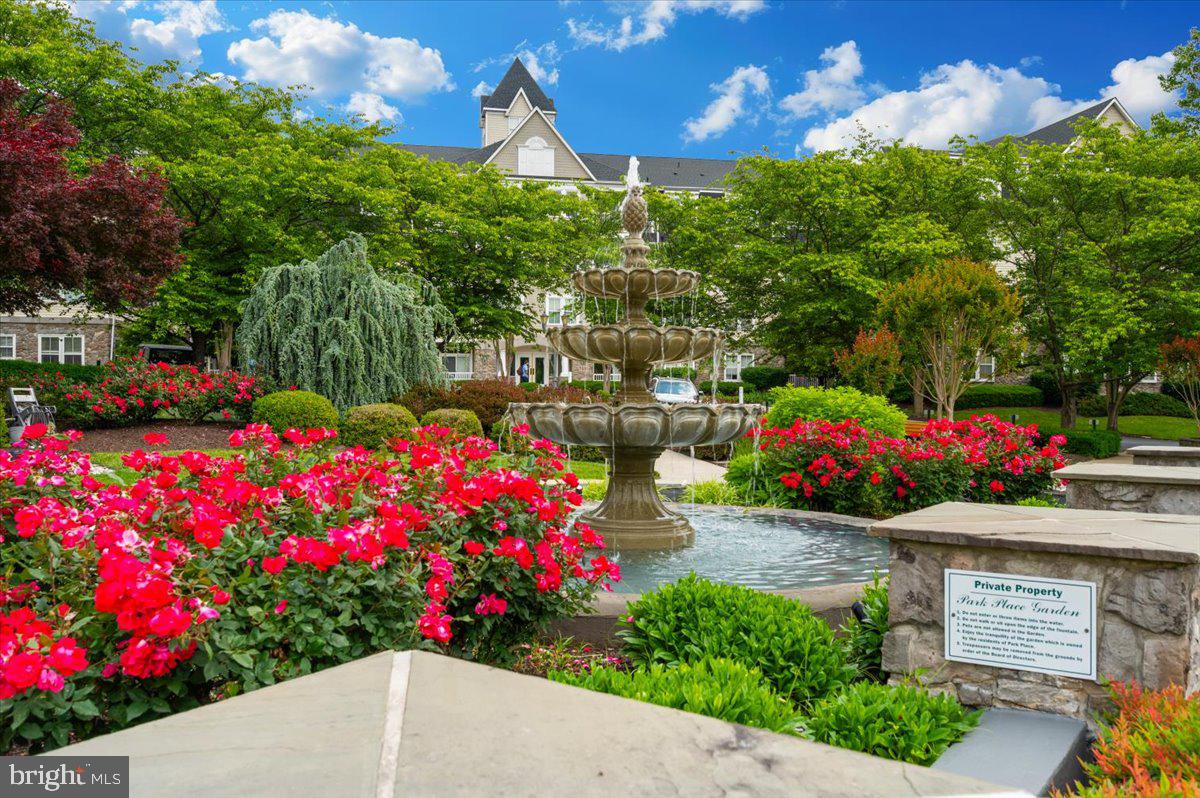 2500 Waterside Drive, Unit 110 Frederick, MD 21701 - Photo 67 of 106 a view of yard with flowers and trees