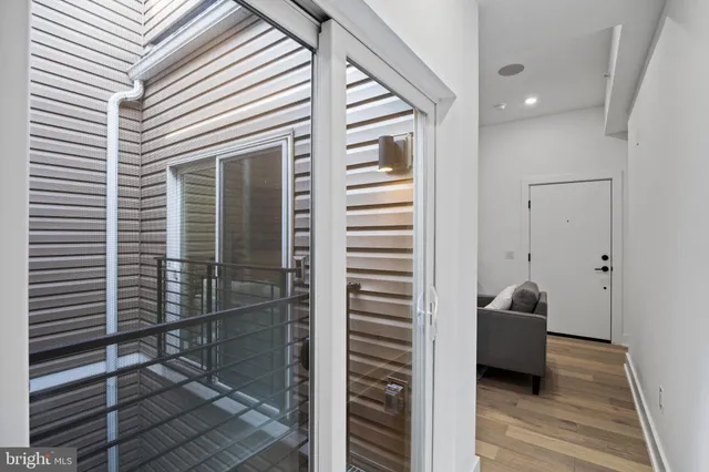 a bathroom with a sink and a window
