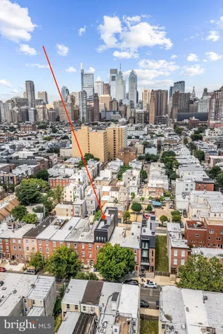 a view of a city with tall buildings