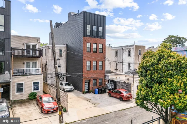 a view of a balcony with city view