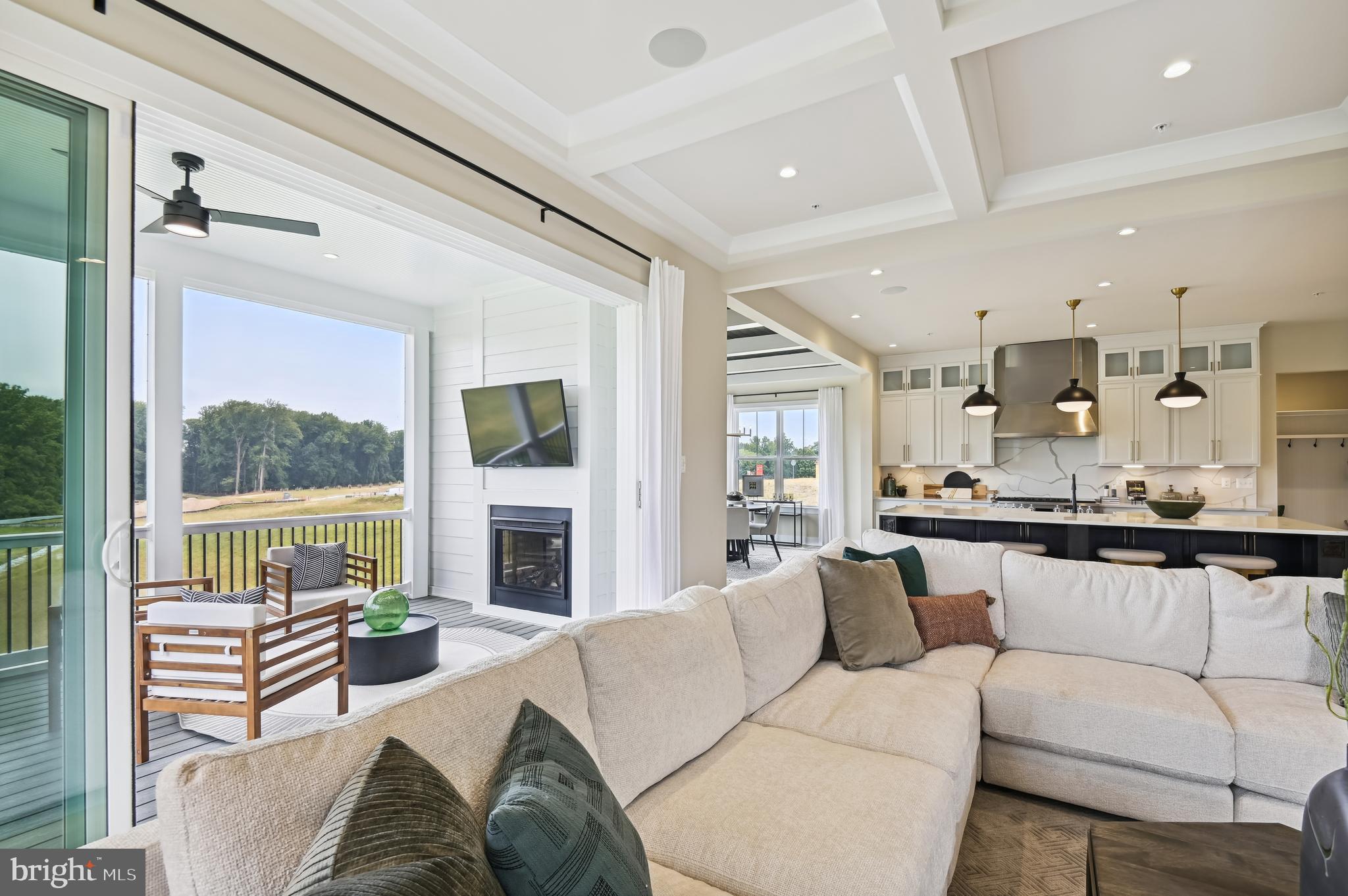 13812 Pecan Ridge Way Bowie, MD 20715 - Photo 11 of 44 a living room with furniture fireplace and flat screen tv