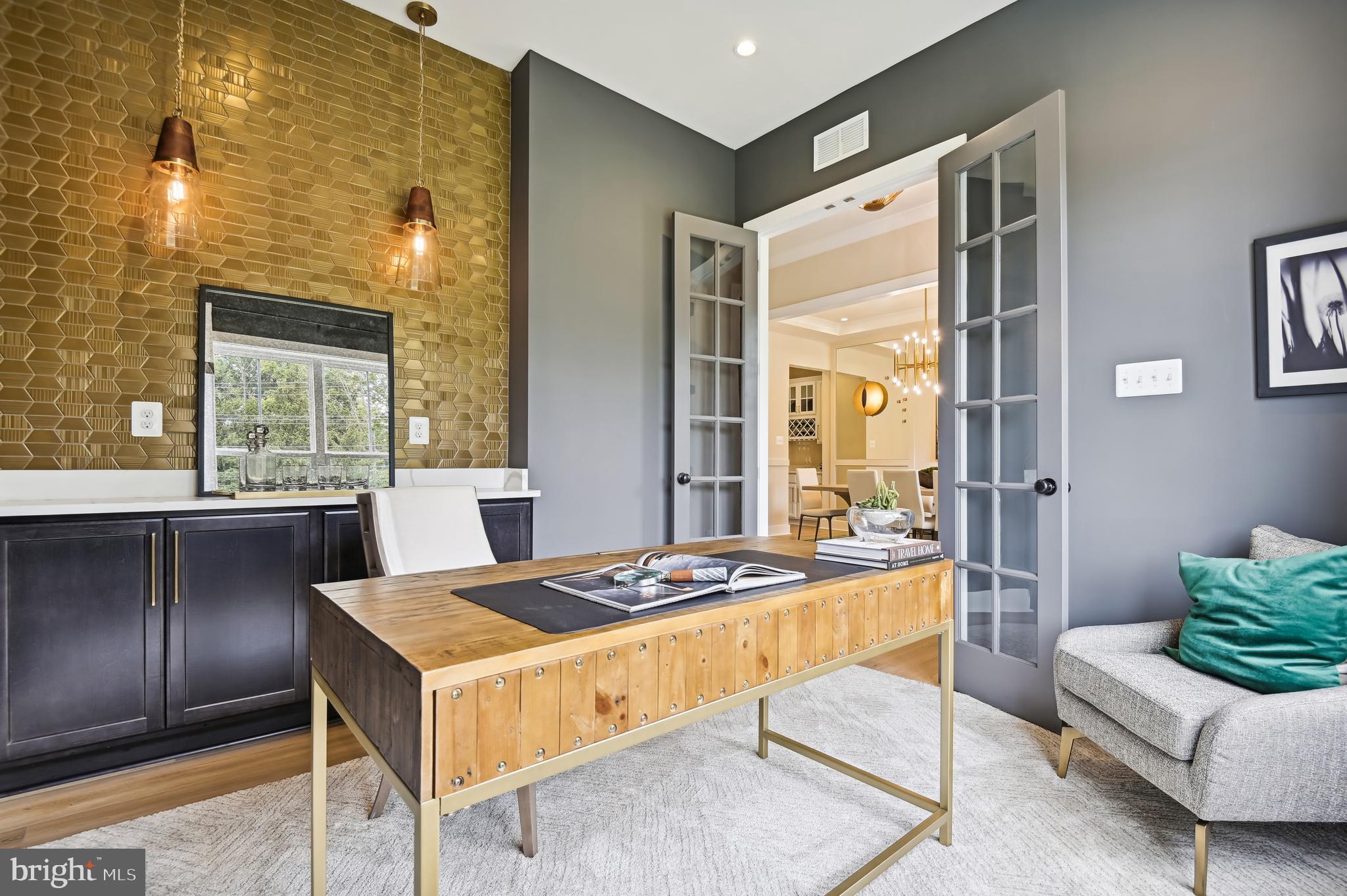 13812 Pecan Ridge Way Bowie, MD 20715 - Photo 17 of 44 a living room with a couch and a table