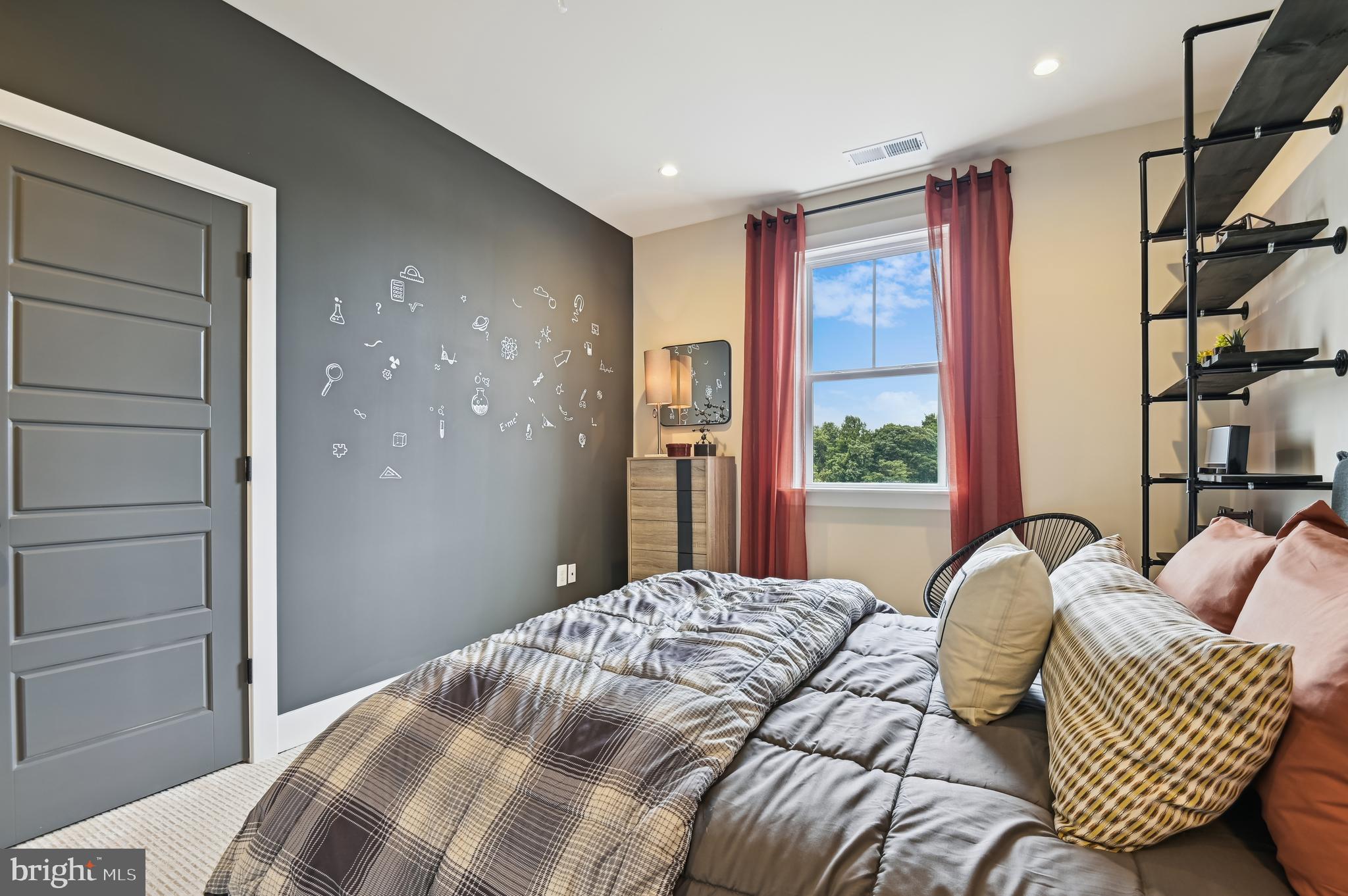 13812 Pecan Ridge Way Bowie, MD 20715 - Photo 28 of 44 a bedroom with a bed and wooden floor