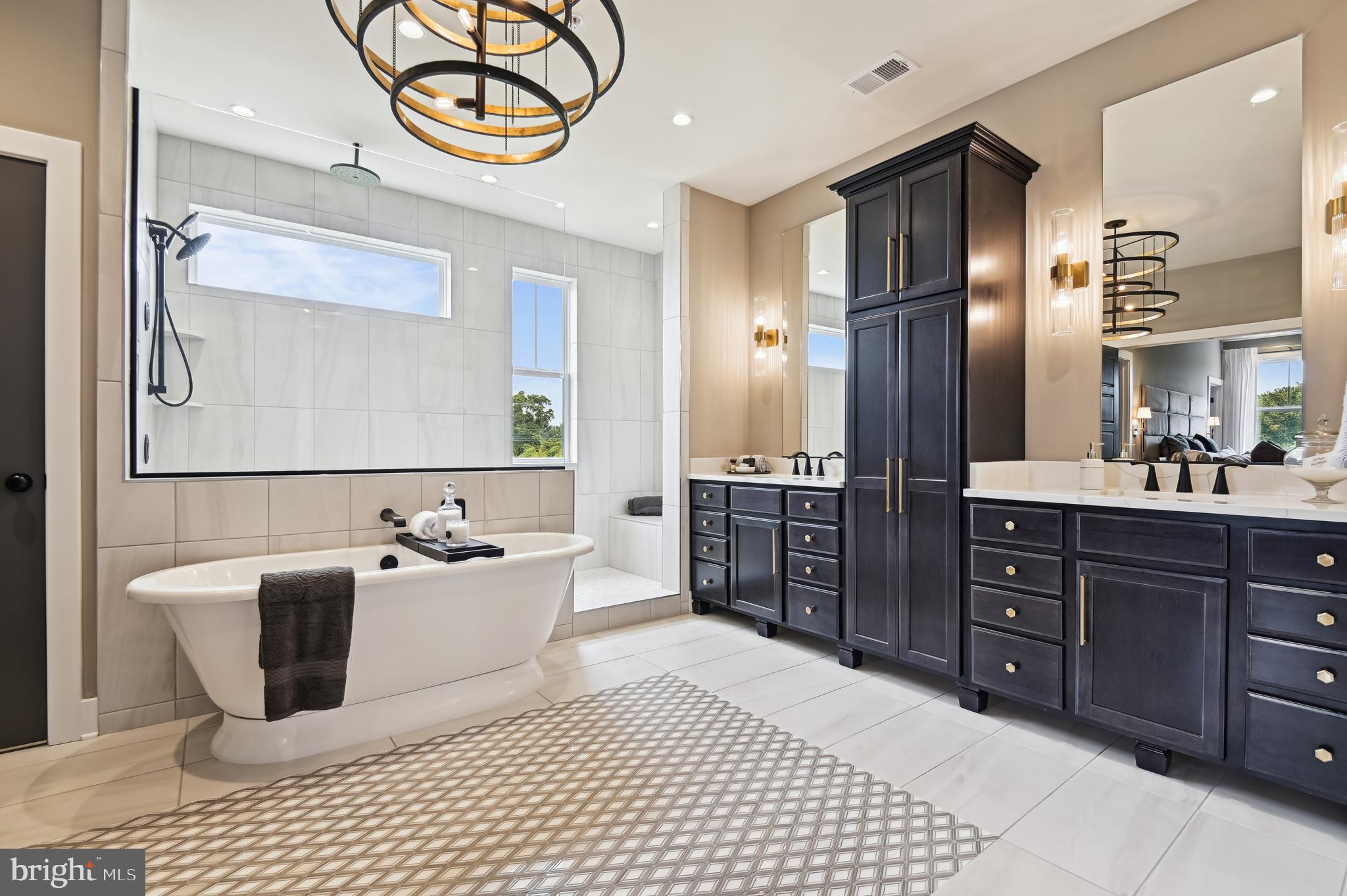 13812 Pecan Ridge Way Bowie, MD 20715 - Photo 32 of 44 a bathroom with a sink a mirror and a shower