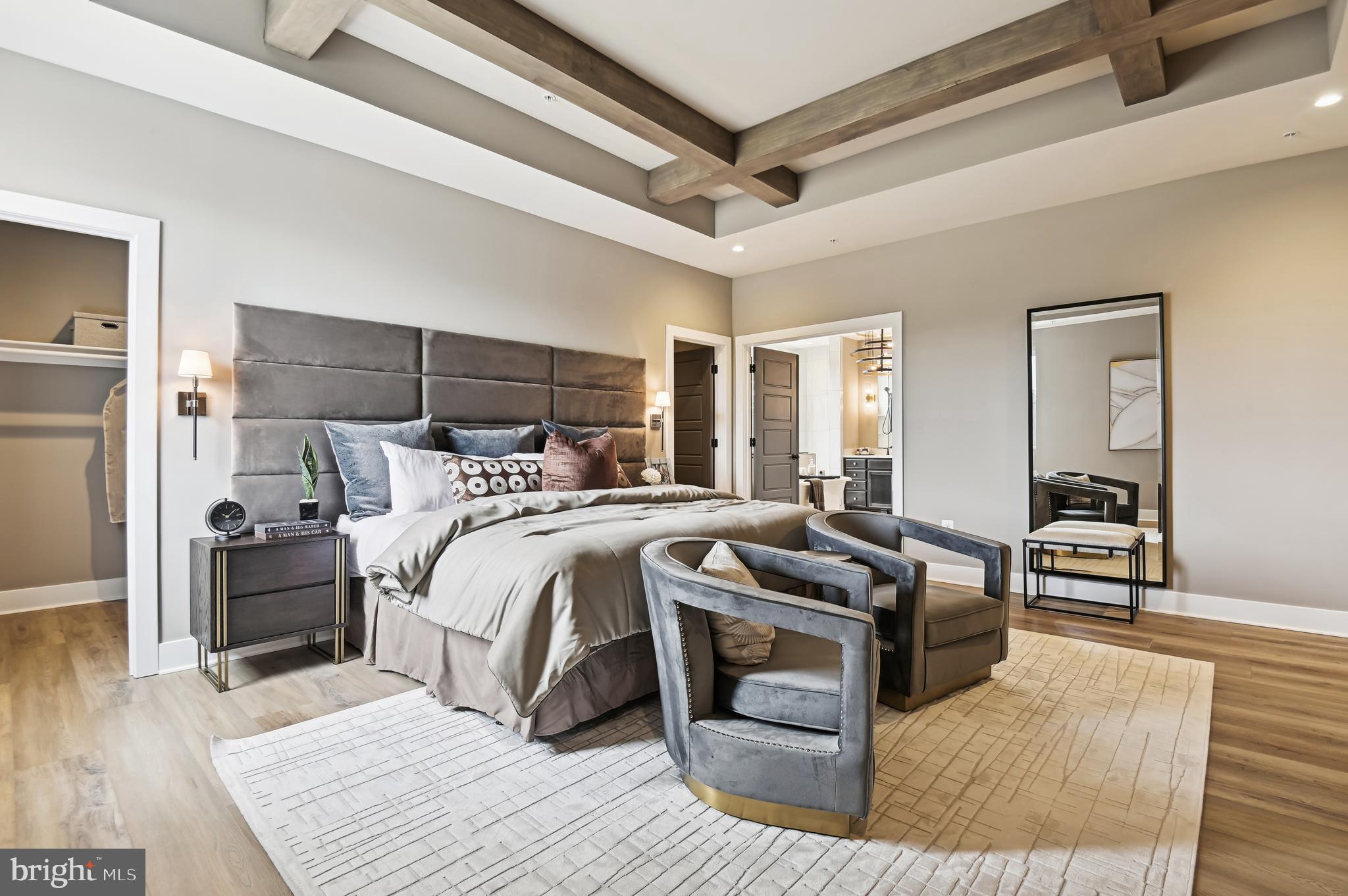 13812 Pecan Ridge Way Bowie, MD 20715 - Photo 34 of 44 a bedroom with a bed and wooden floor