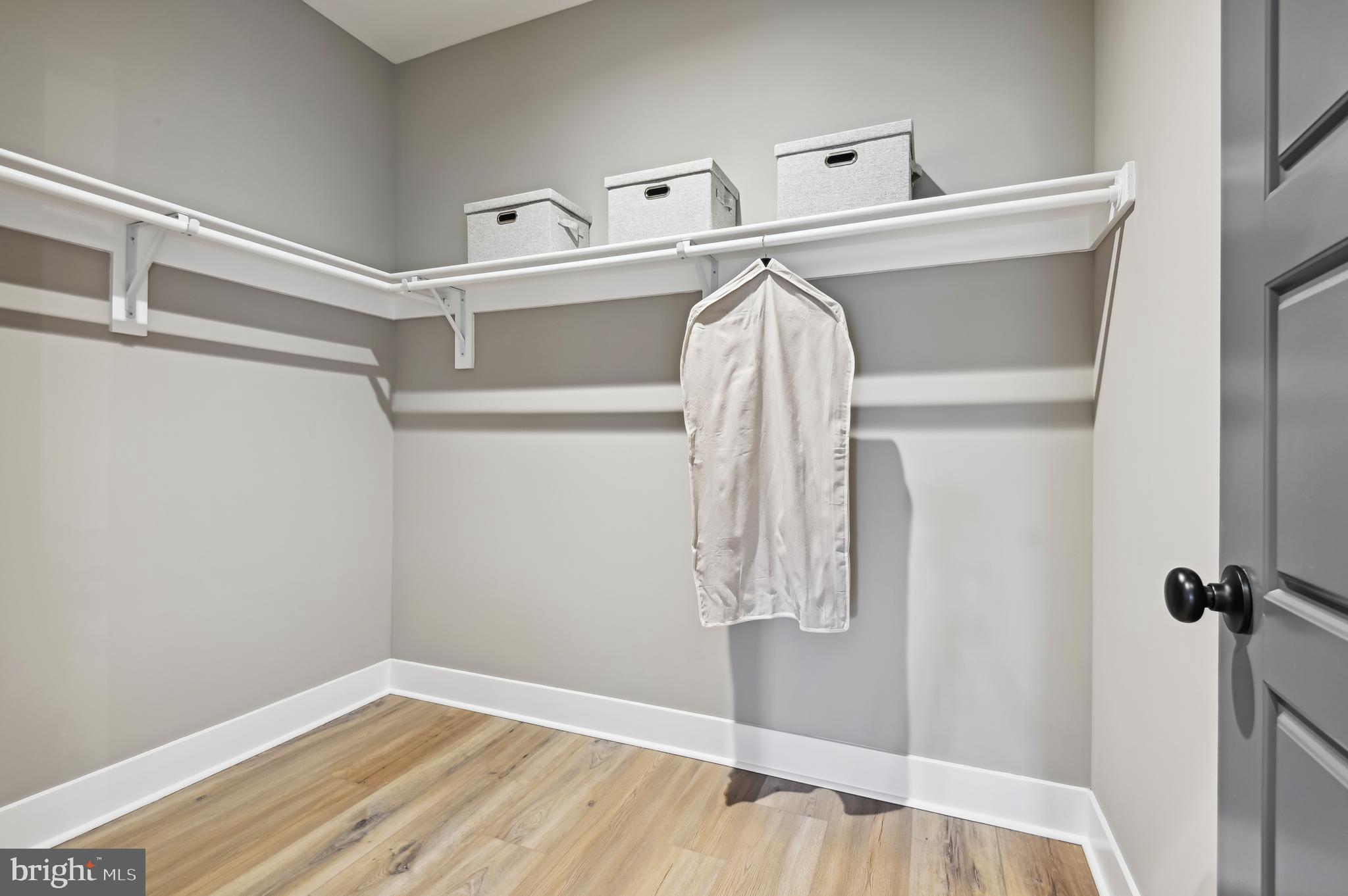 13812 Pecan Ridge Way Bowie, MD 20715 - Photo 37 of 44 a view of walk in closet with clothes and shoes