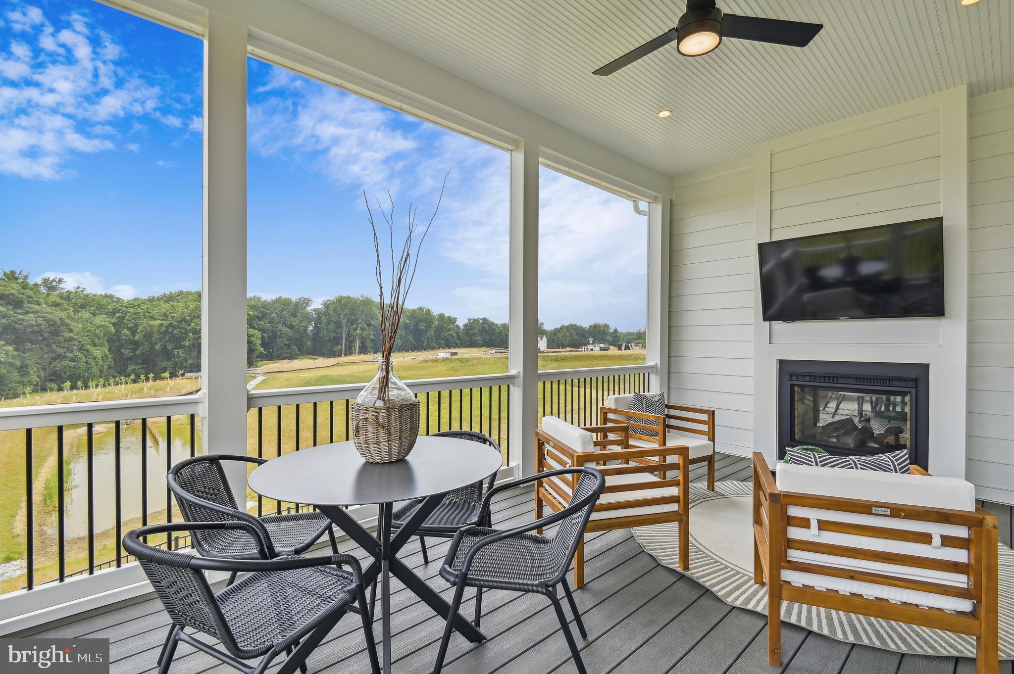 13812 Pecan Ridge Way Bowie, MD 20715 - Photo 43 of 44 a view of a chairs and table in patio