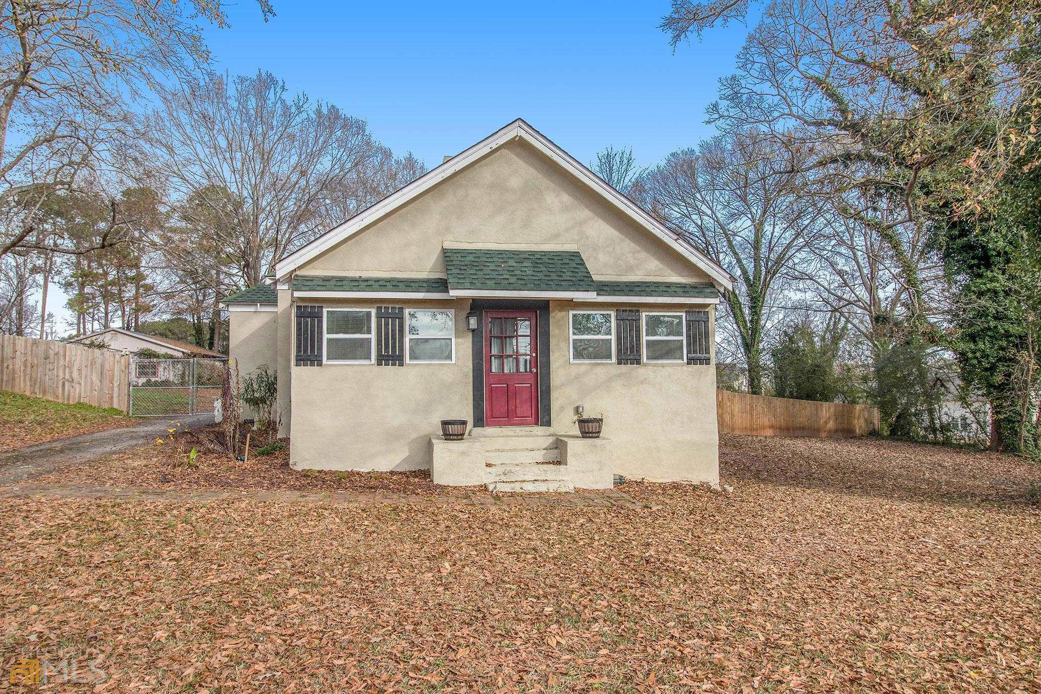 3624 Rex Road Rex, GA 30273 - Photo 1 of 1 a front view of a house with a yard