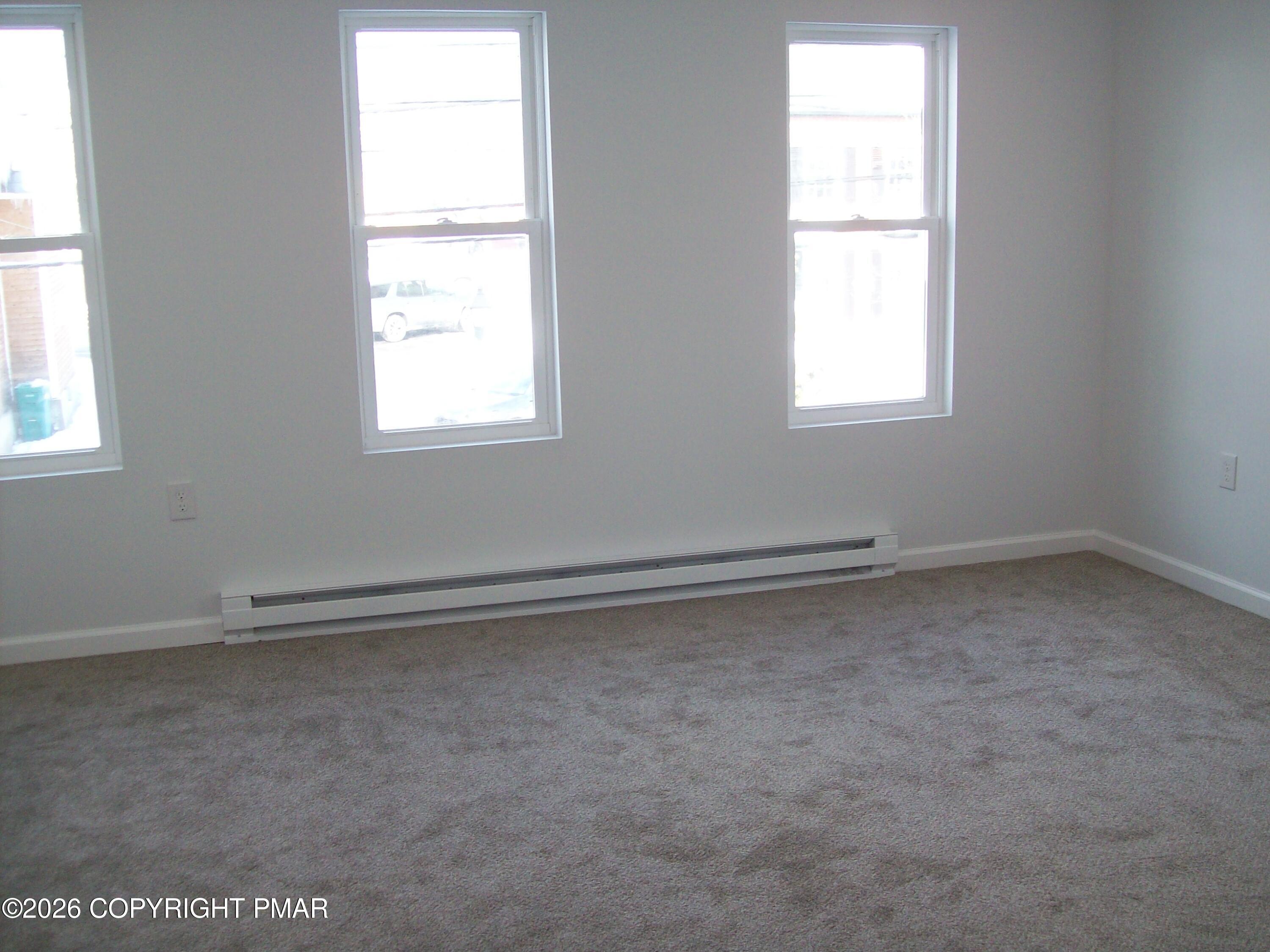 733 Ann Street, Unit 2 Stroudsburg, PA 18360 - Photo 11 of 16 an empty room with a window