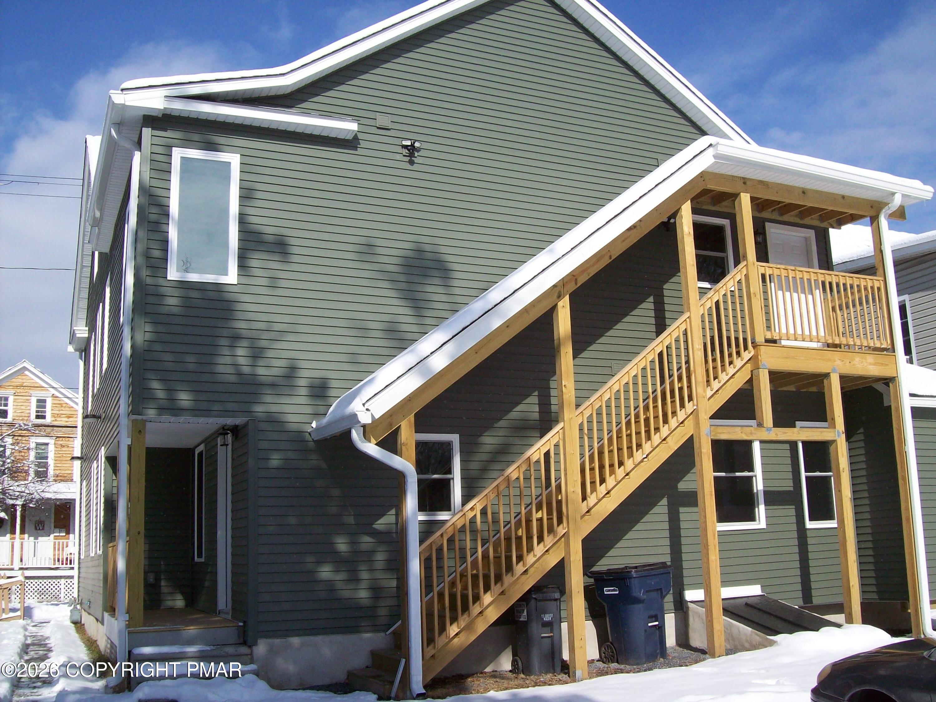 733 Ann Street, Unit 2 Stroudsburg, PA 18360 - Photo 2 of 16 a front view of a house with balcony