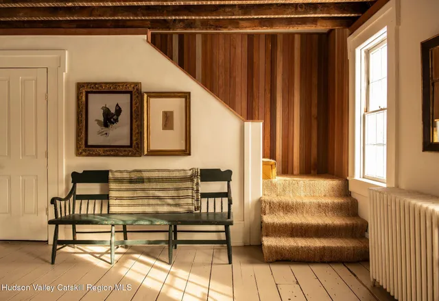 a view of front door with furniture