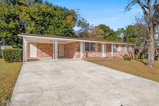 front view of house with a yard