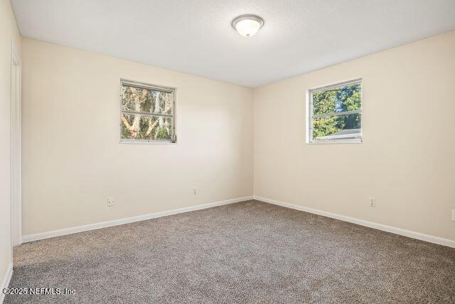 1130 Crown Drive Jacksonville, FL 32221 - Photo 16 of 27 an empty room with a window