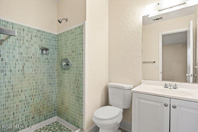 1130 Crown Drive Jacksonville, FL 32221 - Photo 18 of 27 a bathroom with a sink a toilet and shower