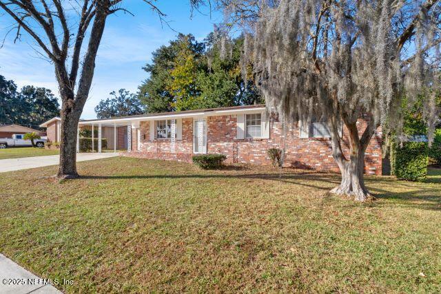 1130 Crown Drive Jacksonville, FL 32221 - Photo 27 of 27 a house view with a garden space