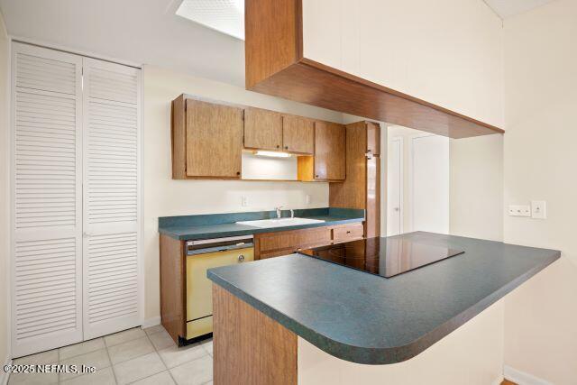 1130 Crown Drive Jacksonville, FL 32221 - Photo 10 of 27 a kitchen with stainless steel appliances granite countertop a sink a stove and a microwave