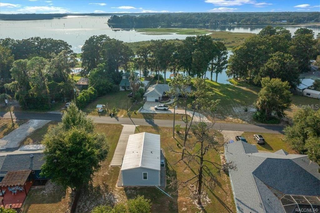 7962 West Riverbend Road Crystal River, FL 34428 - Photo 24 of 30 an aerial view of lake residential house with outdoor space and trees around