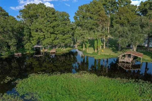an aerial view of a golf course with a garden