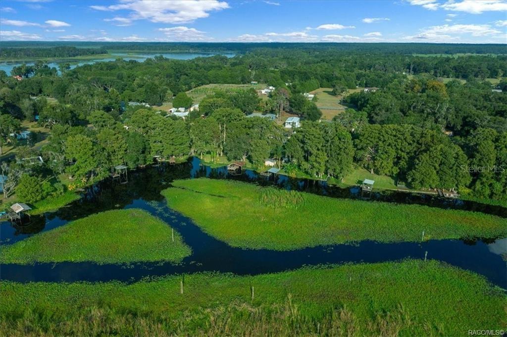 7962 West Riverbend Road Crystal River, FL 34428 - Photo 27 of 30 an aerial view of a golf course with a garden