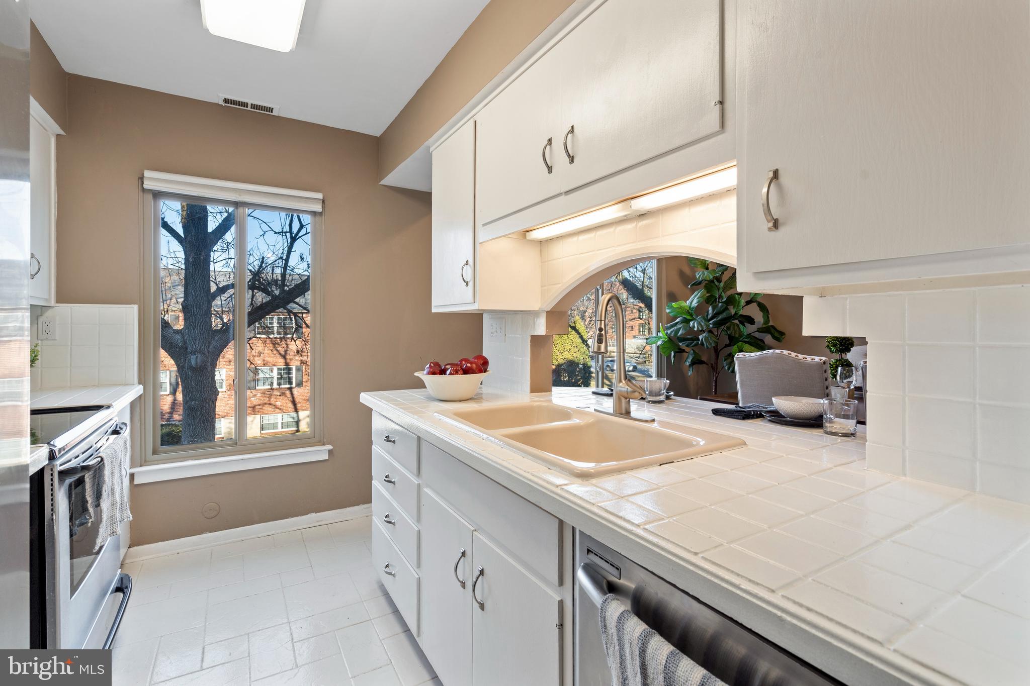 519 St Davids Road, Unit 3 Wayne, PA 19087 - Photo 12 of 31 a kitchen with sink and window
