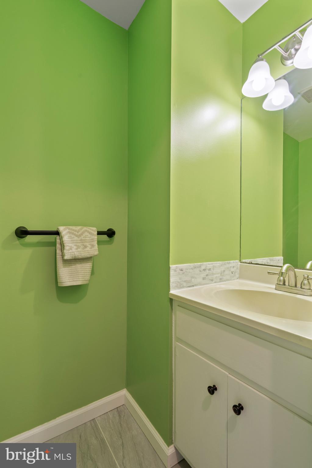 519 St Davids Road, Unit 3 Wayne, PA 19087 - Photo 16 of 31 a bathroom with a sink and a mirror