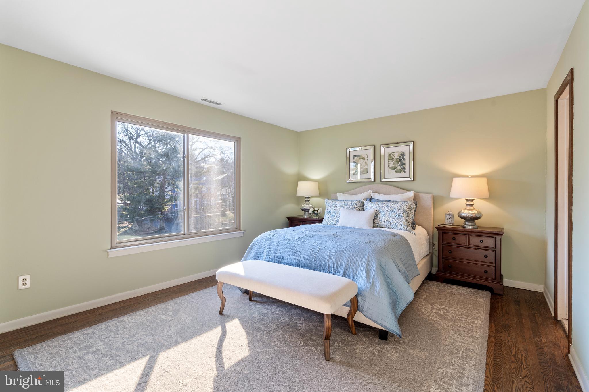 519 St Davids Road, Unit 3 Wayne, PA 19087 - Photo 17 of 31 a spacious bedroom with a bed and a window