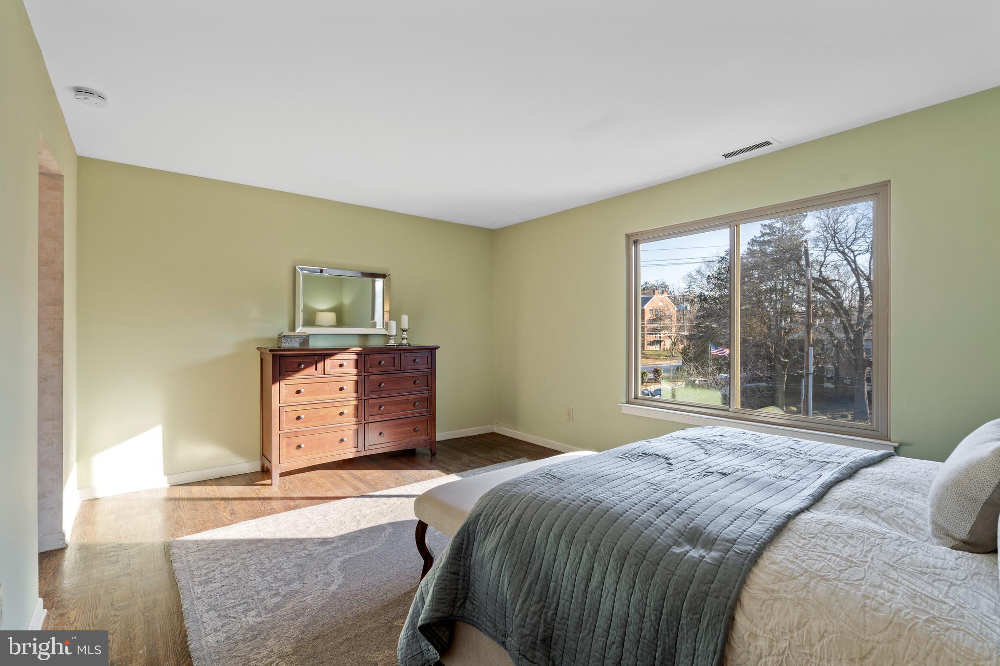 519 St Davids Road, Unit 3 Wayne, PA 19087 - Photo 18 of 31 a bedroom with a bed and window