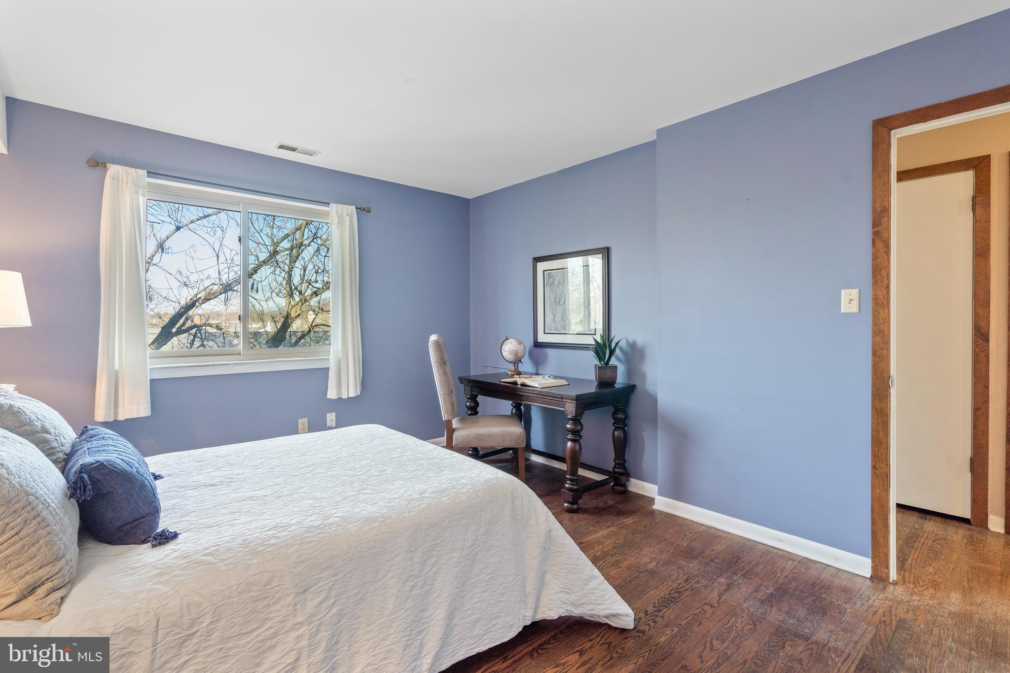519 St Davids Road, Unit 3 Wayne, PA 19087 - Photo 22 of 31 a bedroom with a bed and a window