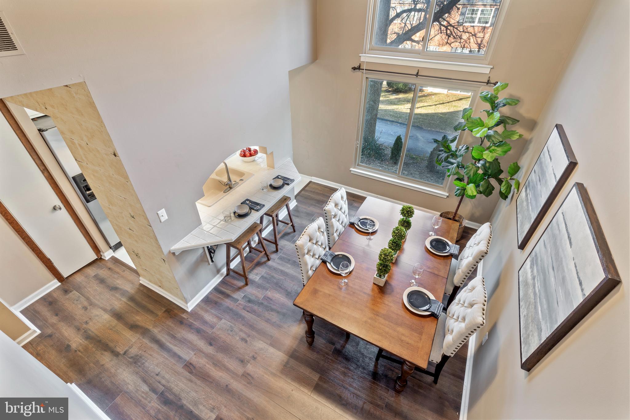 519 St Davids Road, Unit 3 Wayne, PA 19087 - Photo 8 of 31 a living room with furniture and wooden floor