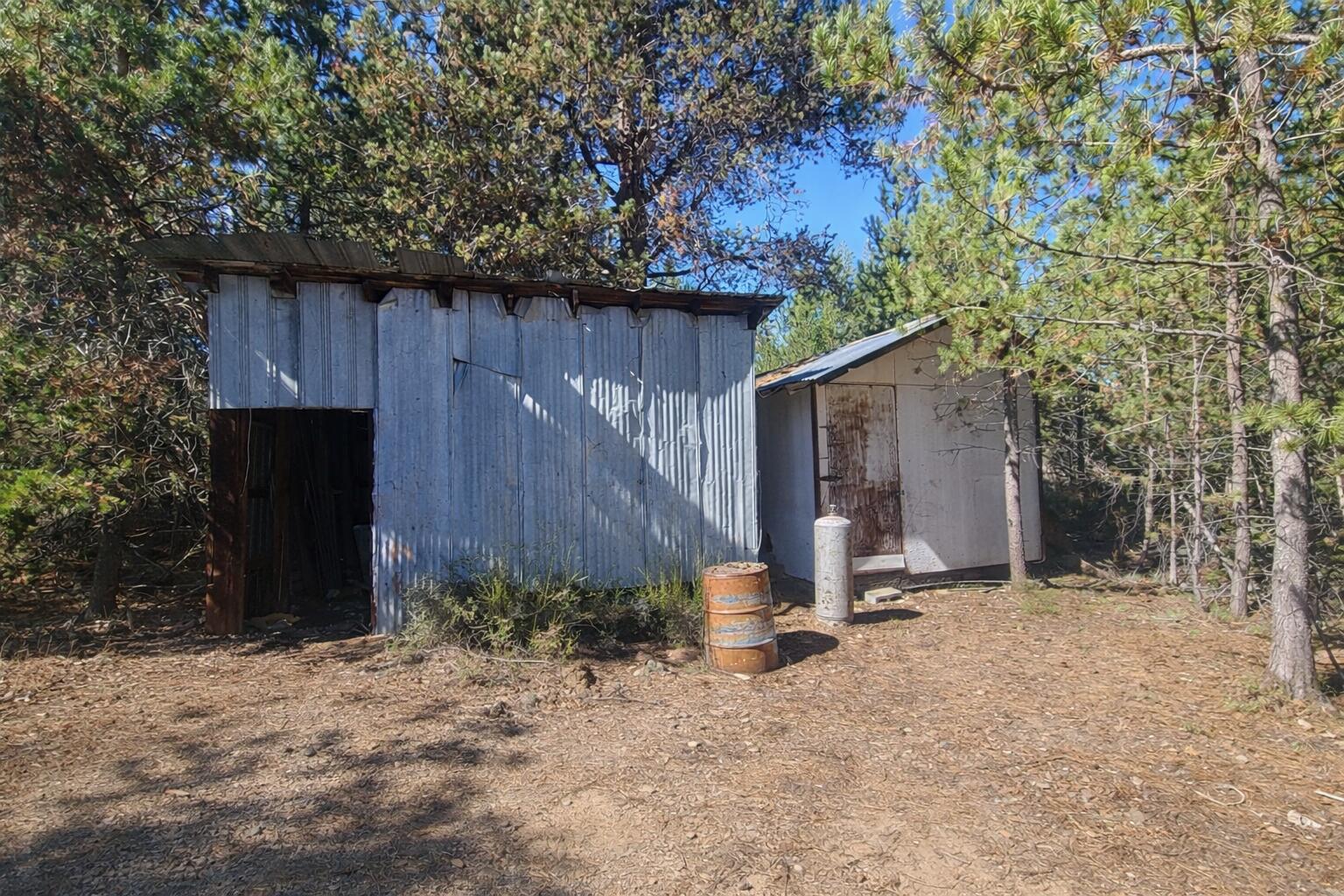 16395 Dawn Road La Pine, OR 97739 - Photo 13 of 33 a backyard of a house with seating space and wooden fence