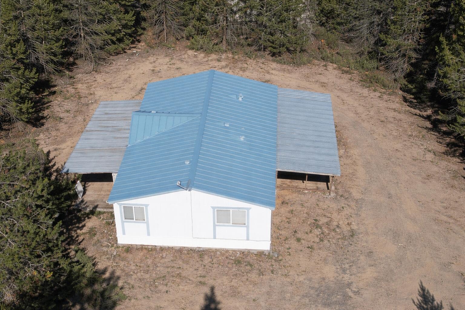 16395 Dawn Road La Pine, OR 97739 - Photo 2 of 33 a view of a house with a yard