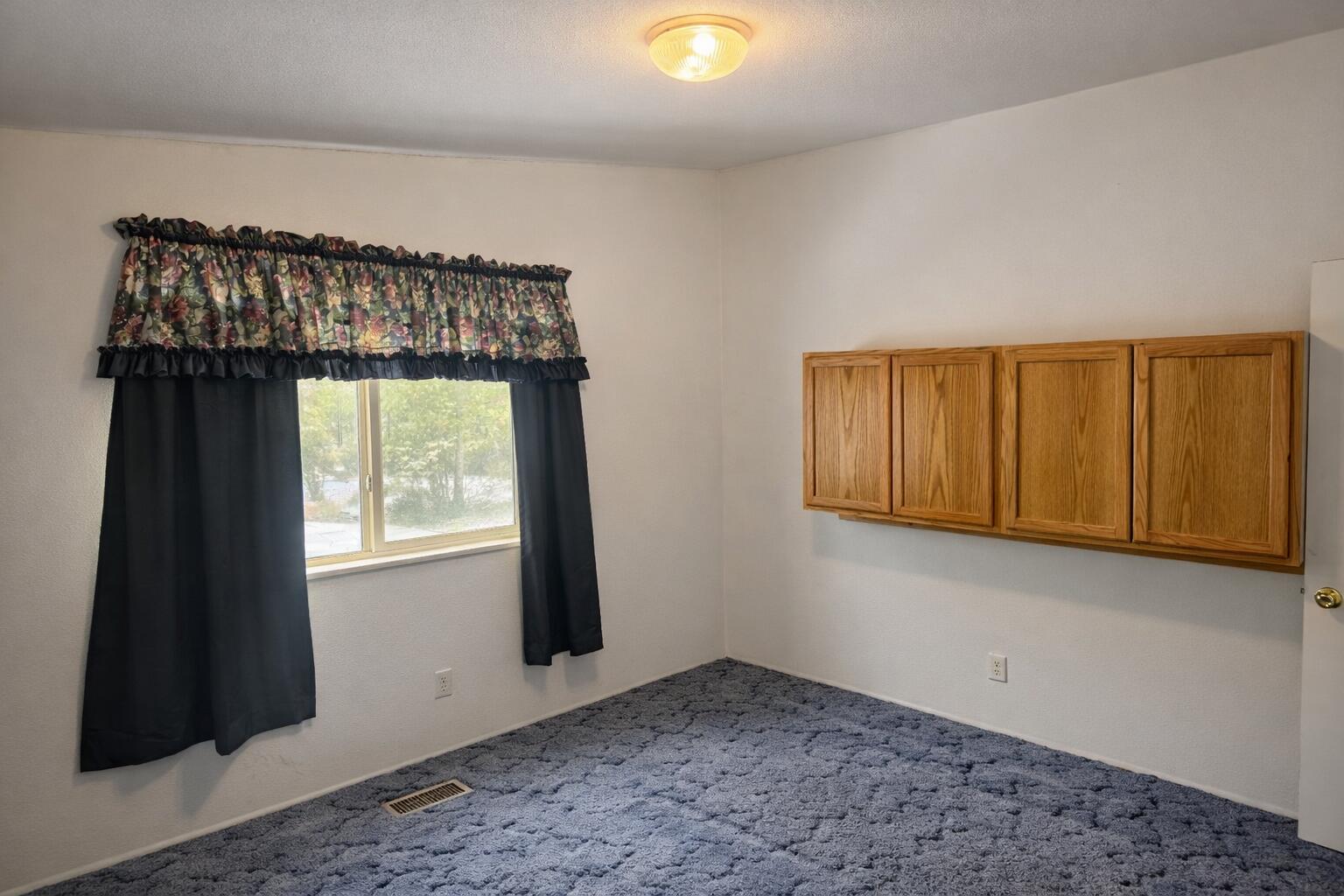 16395 Dawn Road La Pine, OR 97739 - Photo 22 of 33 a view of an empty room with a window