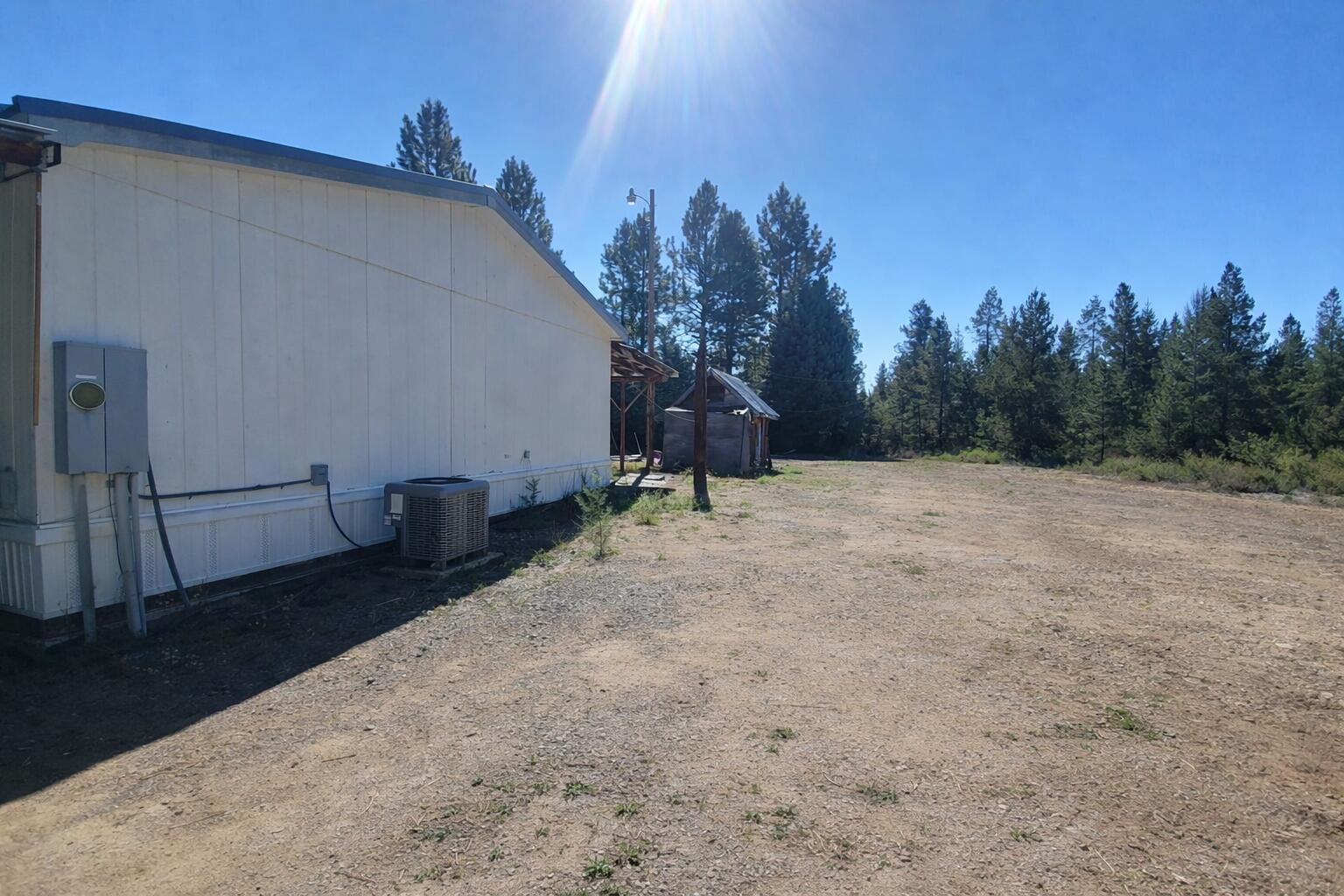 16395 Dawn Road La Pine, OR 97739 - Photo 3 of 33 a view of a backyard of the house
