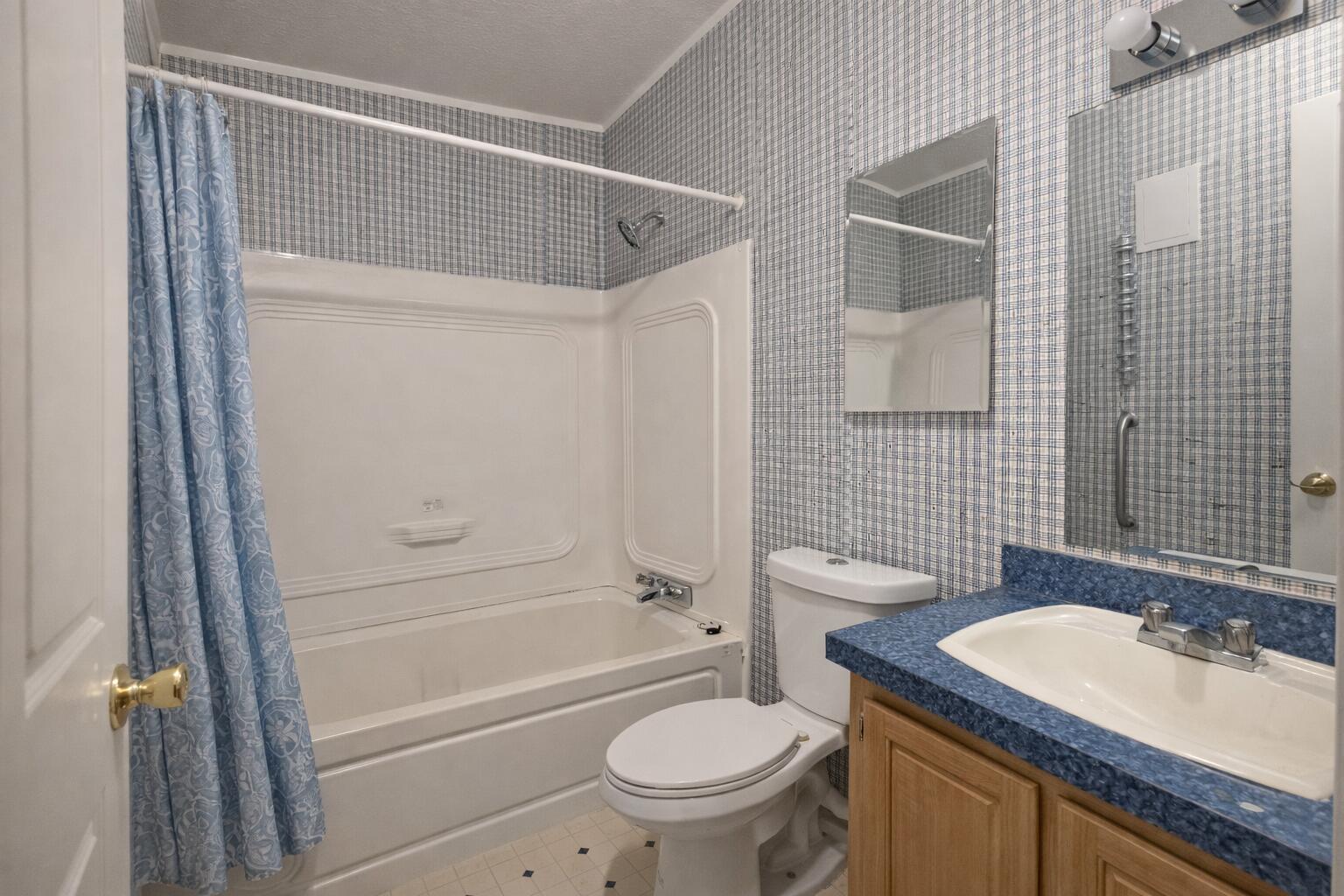 16395 Dawn Road La Pine, OR 97739 - Photo 32 of 33 a bathroom with a granite countertop sink toilet and shower
