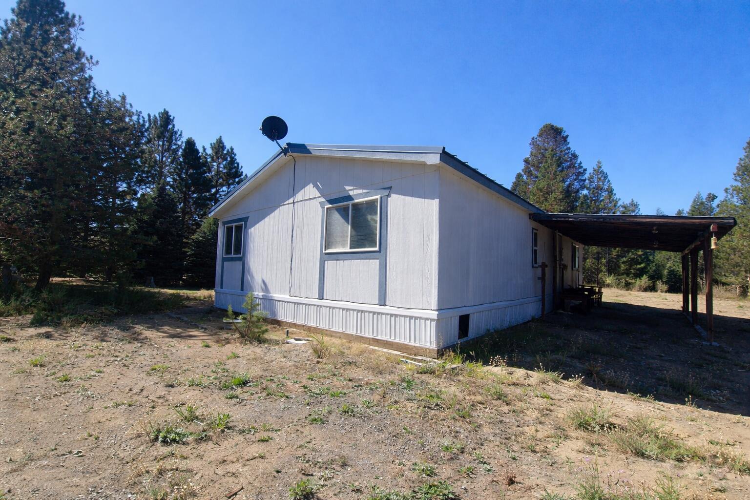 16395 Dawn Road La Pine, OR 97739 - Photo 4 of 33 a view of a house with a yard