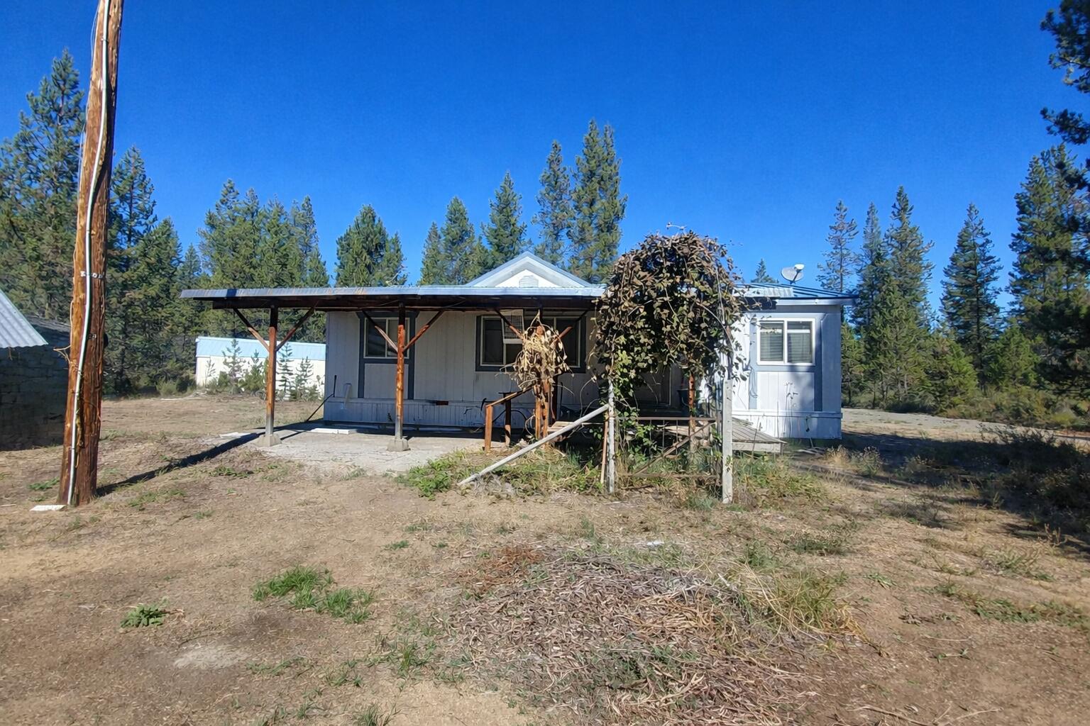 16395 Dawn Road La Pine, OR 97739 - Photo 6 of 33 a view of a house with a yard