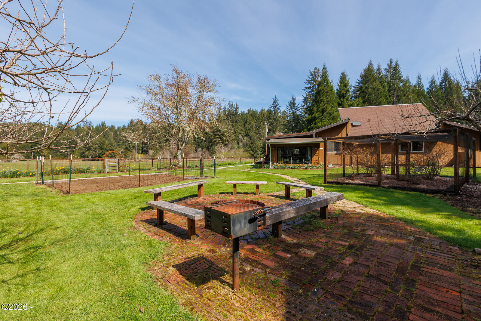 871 Old River Road Northeast Siletz, OR 97380 - Photo 46 of 86 Brick lined firepit