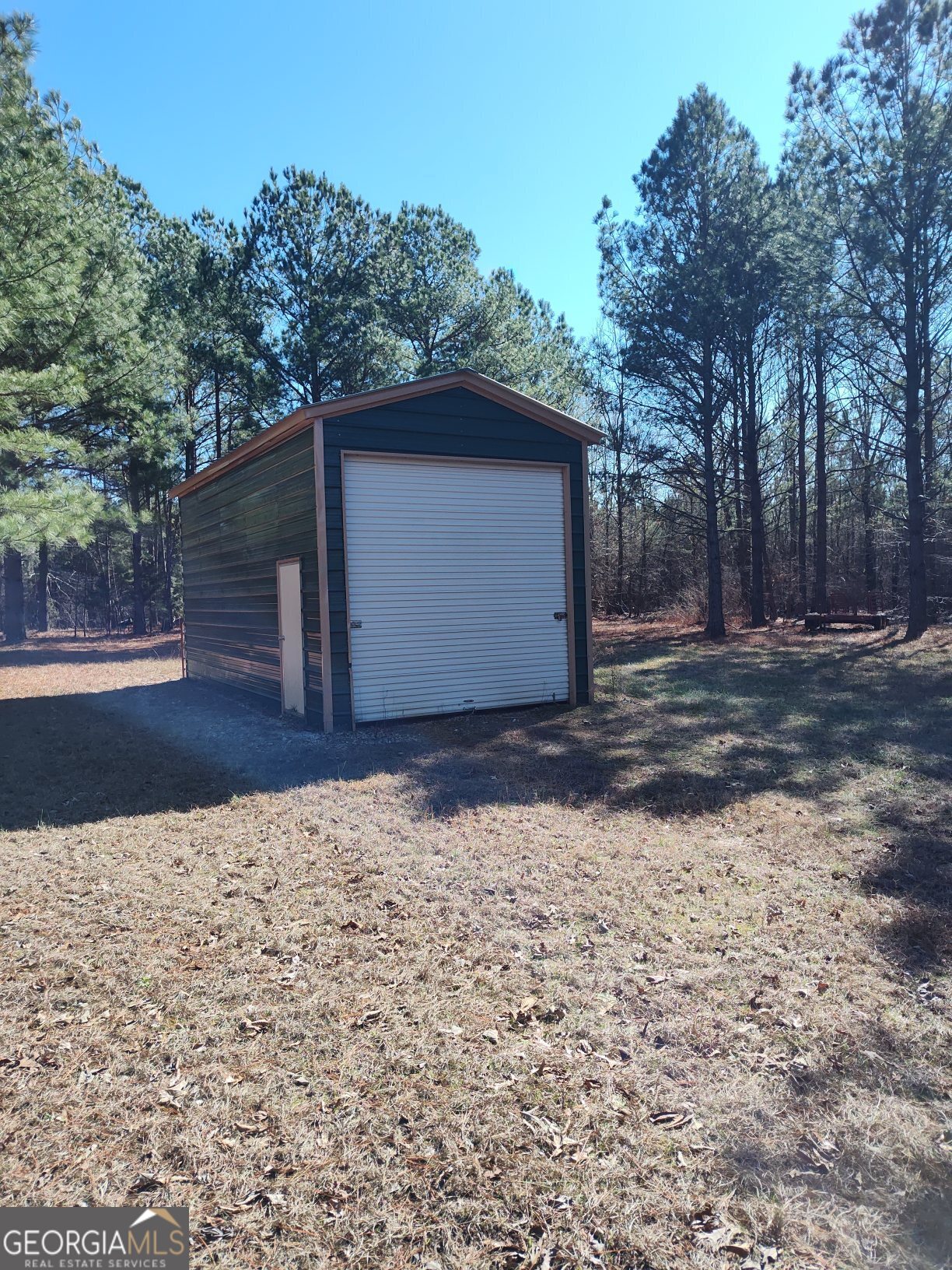 1862 Pearl Mill Road Elberton, GA 30635 - Photo 4 of 16 a view of backyard and wooden fence