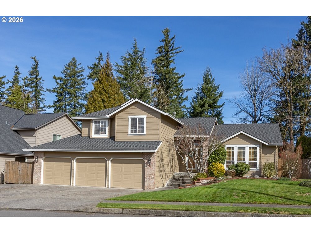 1811 Northwest 19th Street Gresham, OR 97030 - Photo 1 of 39 a front view of a house with a yard
