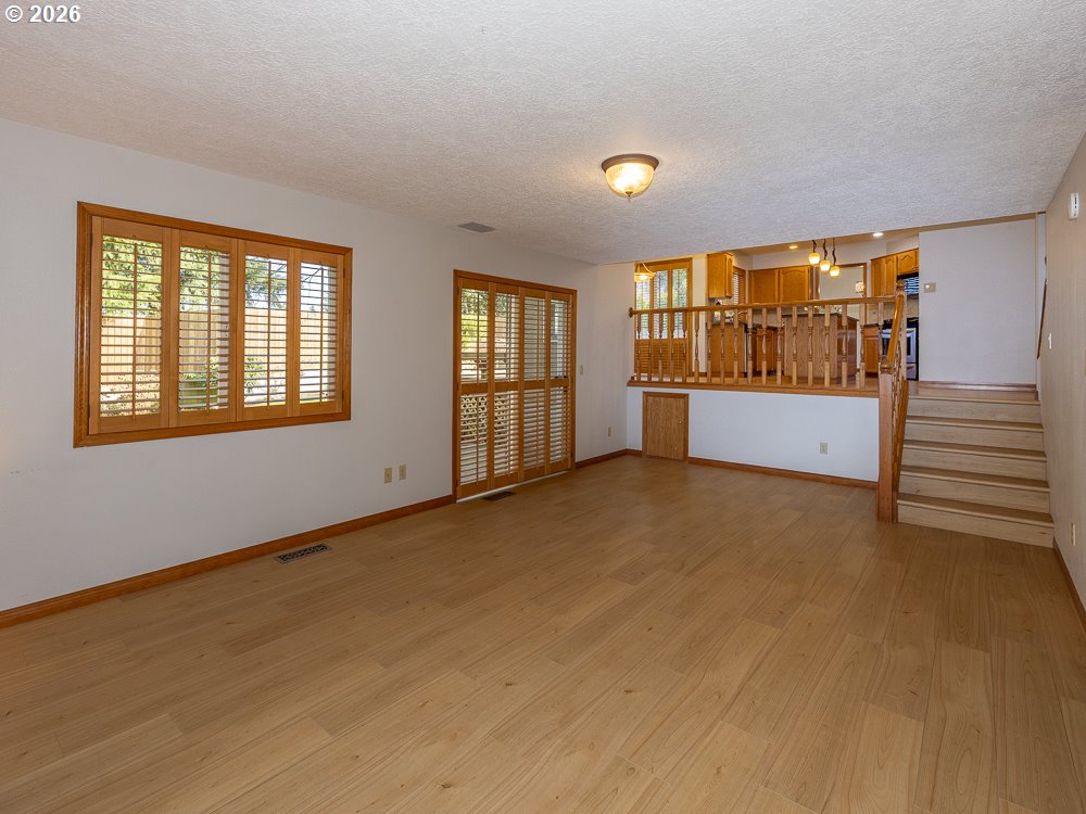 1811 Northwest 19th Street Gresham, OR 97030 - Photo 14 of 39 a view of an empty room with a window