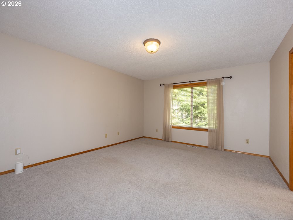 1811 Northwest 19th Street Gresham, OR 97030 - Photo 18 of 39 an empty room with windows