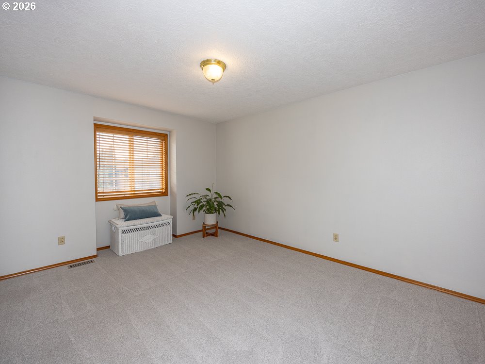 1811 Northwest 19th Street Gresham, OR 97030 - Photo 26 of 39 an empty room with windows