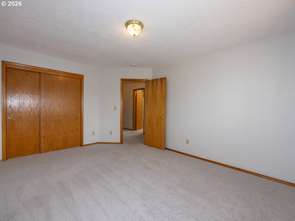 1811 Northwest 19th Street Gresham, OR 97030 - Photo 27 of 39 an empty room with windows