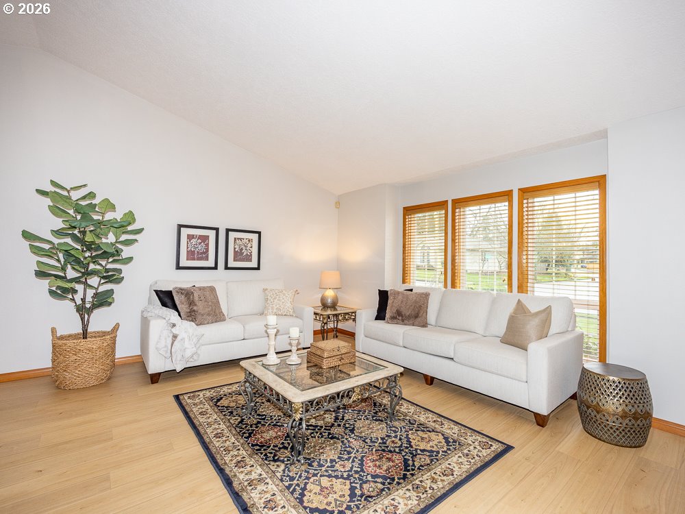 1811 Northwest 19th Street Gresham, OR 97030 - Photo 3 of 39 a living room with furniture and a potted plant