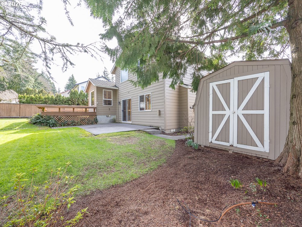 1811 Northwest 19th Street Gresham, OR 97030 - Photo 37 of 39 a view of a house with backyard and tree