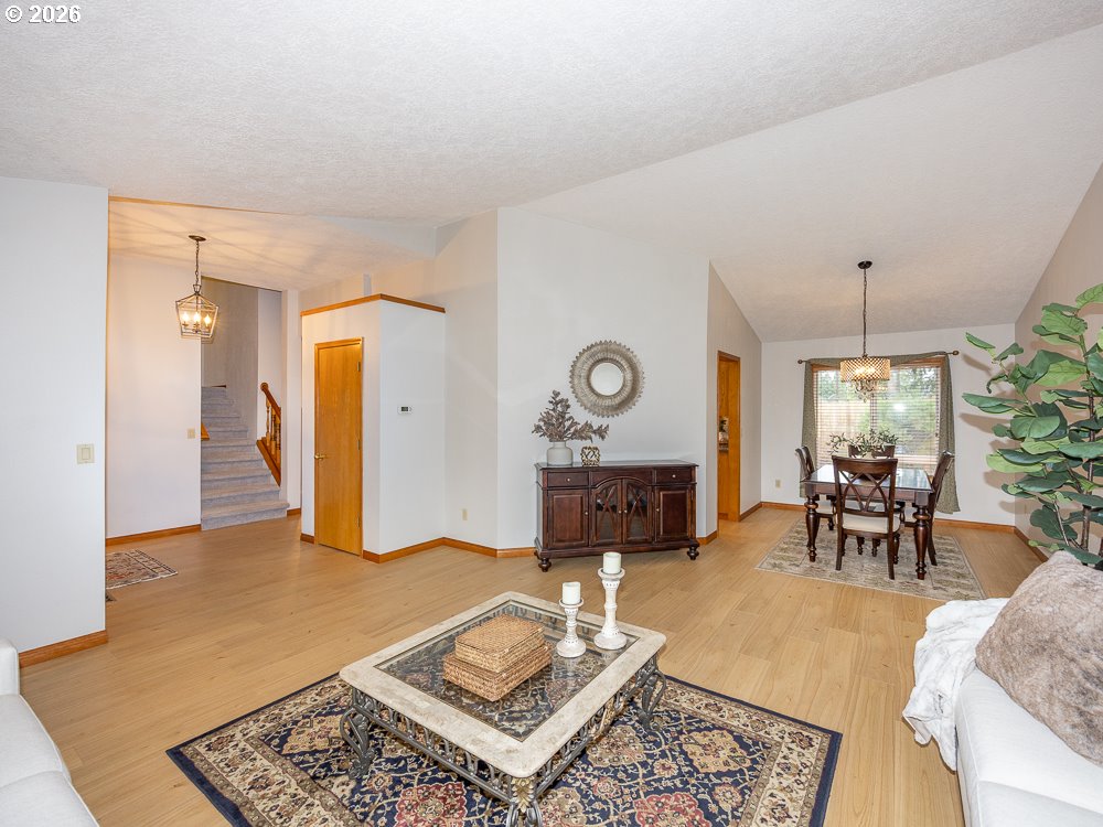 1811 Northwest 19th Street Gresham, OR 97030 - Photo 7 of 39 a living room with furniture and a table