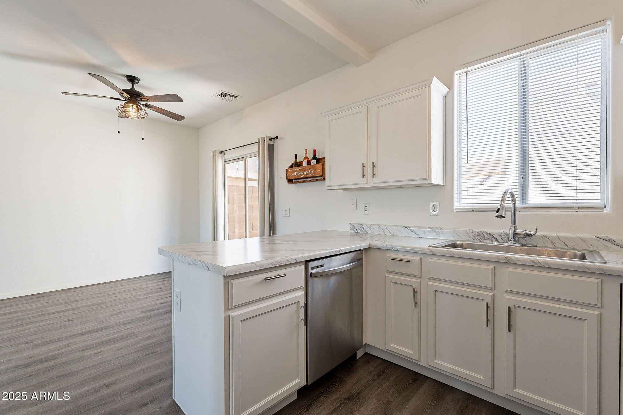 2300 East Magma Road, Unit 160 San Tan Valley, AZ 85143 - Photo 12 of 44 a kitchen with cabinets appliances and a sink