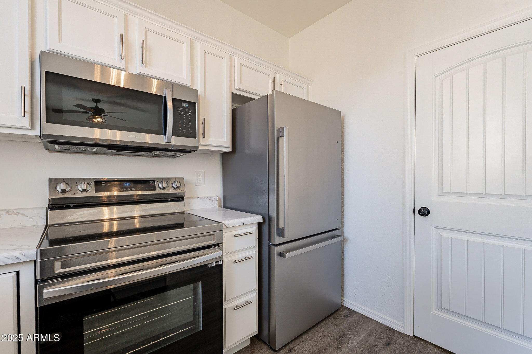 2300 East Magma Road, Unit 160 San Tan Valley, AZ 85143 - Photo 14 of 44 a kitchen with appliances and cabinets